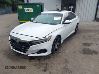 2021 Honda Accord Touring with VIN 1HGCV2F96MA018262, listed as a IAAI auction lot 42498042 with 66,038 mi miles and . Bid and sale history available at DreamBid. Image 2.