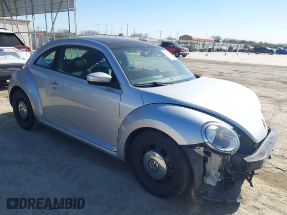 2013 Volkswagen Beetle 2.5L w/Sun/Sound/Nav with VIN 3VWJX7AT3DM663774, listed as a IAAI auction lot 41738146 with 98,064 mi miles and . Bid and sale history available at DreamBid. Image 1.