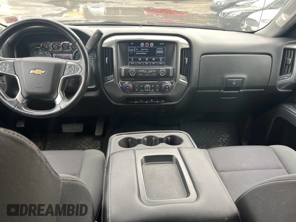 2014 Chevrolet Silverado 1500 LT with VIN 1GCVKREH1EZ169899, listed as a IAAI auction lot 42143501 with 124,789 mi miles and . Bid and sale history available at DreamBid. Image 10.