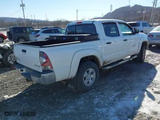 2011 Toyota Tacoma with VIN 3TMLU4EN0BM064052, listed as a IAAI auction lot 41423819 with 185,729 mi miles. Bid and sale history available at carsss.com. Image 4.