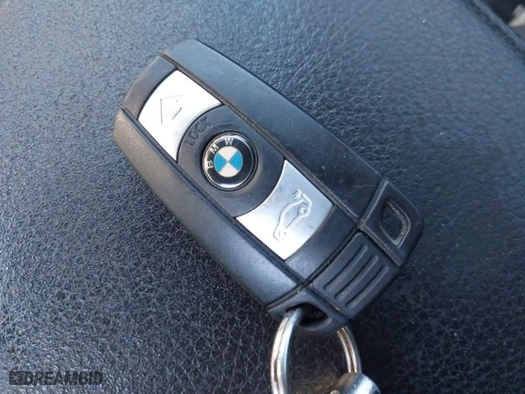 2013 BMW 3 Series 335i with VIN WBAKG7C51DJ438155, listed as a IAAI auction lot 41781417 with 139,415 mi miles. Bid and sale history available at carsss.com. Image 11.