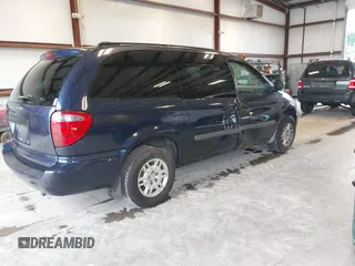 2005 Dodge Caravan SE with VIN 1D4GP24R55B294220, listed as a IAAI auction lot 42381175 with 260,980 mi miles and . Bid and sale history available at DreamBid. Image 4.