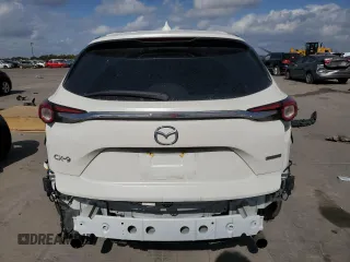 2021 Mazda CX-9 Grand Touring with VIN JM3TCADY2M0519977, listed as a Copart auction lot 76137724 with 31,306 mi miles and Salvage title. Bid and sale history available at DreamBid. Image 6.