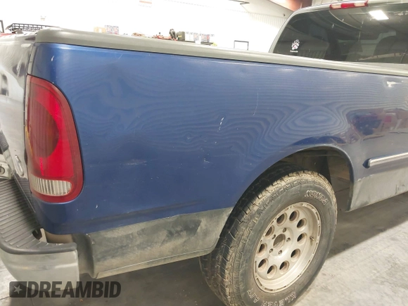 1997 Ford F-150 with VIN 1FTDF1767VKC52713, listed as a IAAI auction lot 42212161 with 136,306 mi miles and . Bid and sale history available at DreamBid. Image 12.