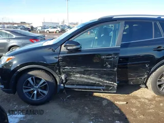 2018 Toyota RAV4 XLE with VIN 2T3RFREV1JW808773, listed as a IAAI auction lot 41595377 with 109,309 mi miles. Bid and sale history available at carsss.com. Image 6.