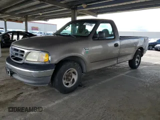 2002 Ford F-150 XL with VIN 1FTRF17W62NB40159, listed as a Copart auction lot 49010765 with 166,719 mi miles and Salvage Title. Bid and sale history available at carsss.com. Image 1.