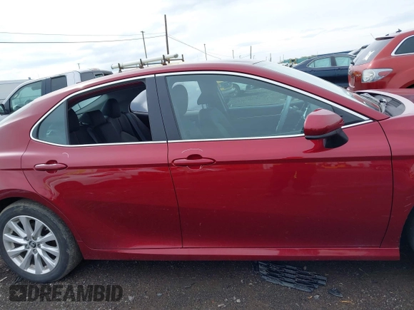 2019 Toyota Camry LE with VIN 4T1B11HK8KU823736, listed as a IAAI auction lot 42166696 with 21,732 mi miles and . Bid and sale history available at DreamBid. Image 13.