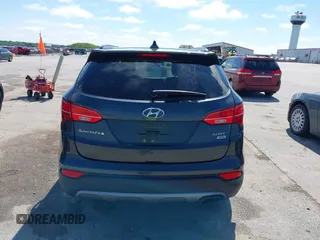2014 Hyundai Santa Fe with VIN 5XYZUDLB0EG187984, listed as a IAAI auction lot 42607599 with 111,594 mi miles and . Bid and sale history available at DreamBid. Image 16.