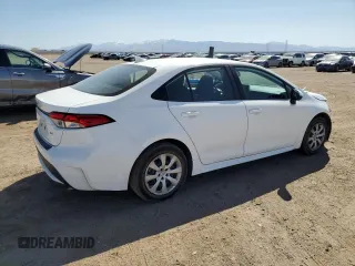 2021 Toyota Corolla LE with VIN 5YFEPMAE0MP211178, listed as a Copart auction lot 52559705 with 59,947 mi miles and Salvage Title. Bid and sale history available at DreamBid. Image 3.