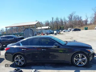 2015 Infiniti Q50 Premium z VIN JN1BV7AR2FM416586, wystawiony jako IAAI lot #41728760 z przebiegiem 138 446 mil mil oraz . Historia ofert i sprzedaży dostępna na DreamBid. Obrazek 14.