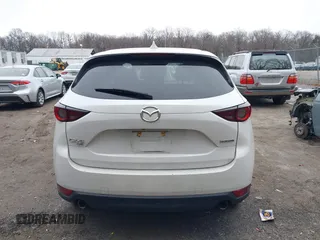 2020 Mazda CX-5 Touring with VIN JM3KFBCM5L1737640, listed as a IAAI auction lot 41613576 with 1 mi miles. Bid and sale history available at carsss.com. Image 15.