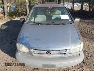 2000 Toyota Sienna LE with VIN 4T3ZF13C5YU181671, listed as a IAAI auction lot 41733892 with 212,013 mi miles. Bid and sale history available at carsss.com. Image 12.