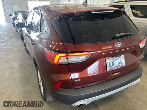 2021 Ford Escape SE with VIN 1FMCU9G6XMUA67635, listed as a IAAI auction lot 42718909 with 89,704 mi miles and . Bid and sale history available at DreamBid. Image 2.