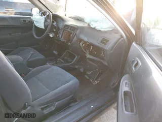 2000 Honda Civic HX with VIN 1HGEJ7225YL109267, listed as a IAAI auction lot 41097182 with 209,943 mi miles. Bid and sale history available at carsss.com. Image 5.