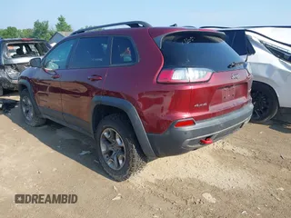 2019 Jeep Cherokee Trailhawk with VIN 1C4PJMBX5KD421043, listed as a IAAI auction lot 42570336 with 114,463 mi miles and . Bid and sale history available at DreamBid. Image 3.