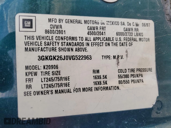 1997 GMC Suburban z VIN 3GKGK26J0VG522963, wystawiony jako Copart lot #56804105 z przebiegiem 297 544 mil mil oraz Tytuł czysty. Historia ofert i sprzedaży dostępna na DreamBid. Obrazek 13.