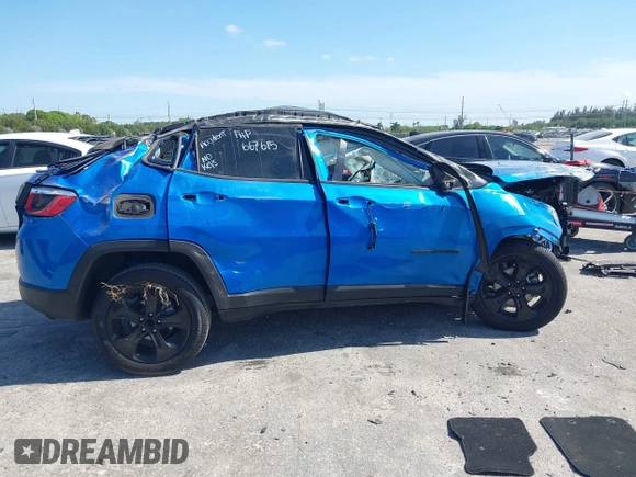 2019 Jeep Compass Latitude with VIN 3C4NJCBB4KT667615, listed as a IAAI auction lot 42154977 with 63,653 mi miles and . Bid and sale history available at DreamBid. Image 12.