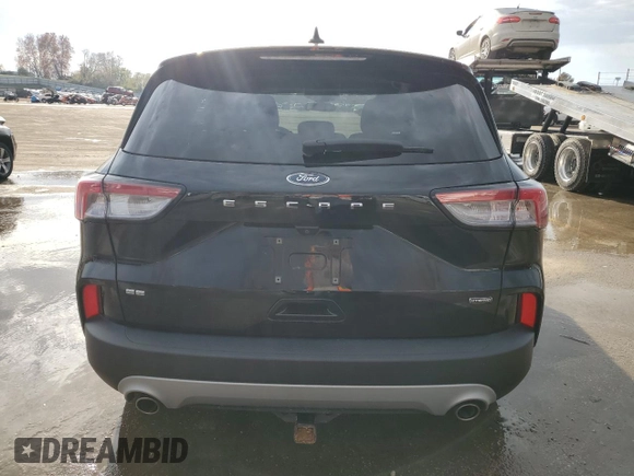 2020 Ford Escape SE Sport Hybrid with VIN 1FMCU0BZ9LUC29685, listed as a Copart auction lot 80930124 with 79,388 mi miles and Salvage title. Bid and sale history available at DreamBid. Image 6.