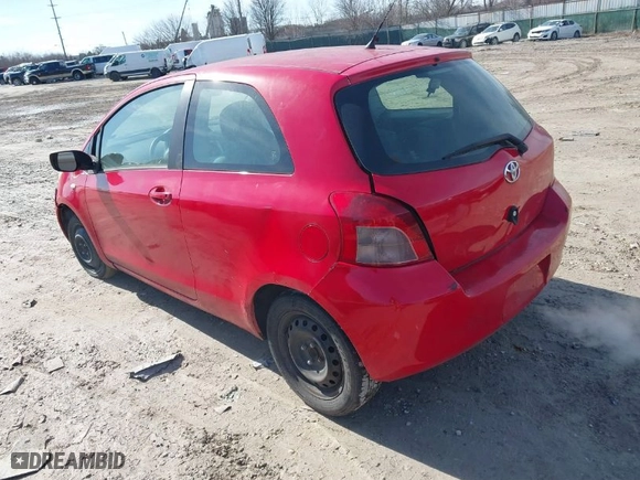 2007 Toyota Yaris with VIN JTDJT923775034473, listed as a IAAI auction lot 41598782 with 203,121 mi miles. Bid and sale history available at carsss.com. Image 3.