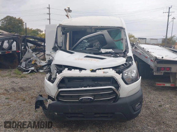 2020 Ford Transit Cargo z VIN 1FTBR1C82LKA61834, wystawiony jako IAAI lot #37802870 z przebiegiem Nie podano mil oraz . Historia ofert i sprzedaży dostępna na DreamBid. Obrazek 11.