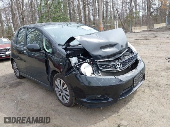 2013 Honda Fit Sport with VIN JHMGE8H59DC046377, listed as a IAAI auction lot 41921693 with 89,704 mi miles. Bid and sale history available at carsss.com. Image 1.