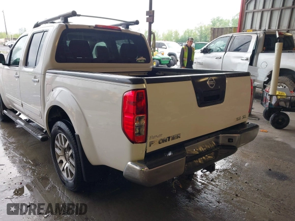 2011 Nissan Frontier Pro-4X with VIN 1N6AD0EV3BC409184, listed as a IAAI auction lot 42122823 with 209,669 mi miles and . Bid and sale history available at DreamBid. Image 3.