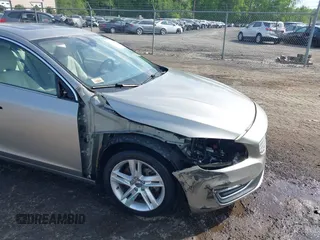 2014 Volvo S60 T5 z VIN YV1612FS3E2278344, wystawiony jako IAAI lot #42135203 z przebiegiem 43 876 mil mil oraz . Historia ofert i sprzedaży dostępna na DreamBid. Obrazek 6.