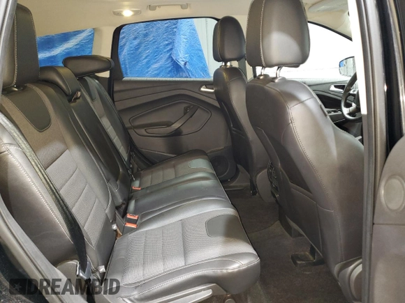 2016 Ford Escape SE with VIN 1FMCU9G97GUB49997, listed as a Copart auction lot 49849005 with 68,996 mi miles and Salvage Title. Bid and sale history available at carsss.com. Image 11.