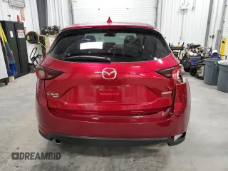 2020 Mazda CX-5 Touring z VIN JM3KFBCM9L0746802, wystawiony jako Copart lot #80276794 z przebiegiem 97 922 mil mil oraz Szkoda całkowita • Salvage title. Historia ofert i sprzedaży dostępna na DreamBid. Obrazek 6.