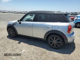 2013 MINI Countryman S with VIN WMWZC3C58DWP20864, listed as a Copart auction lot 64034385 with 72,487 mi miles and Clean title. Bid and sale history available at DreamBid. Image 2.