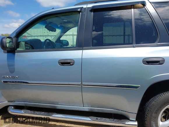 2006 GMC Envoy SLE with VIN 1GKDS13S362310613, listed as a IAAI auction lot 41881880 with 202,893 mi miles. Bid and sale history available at carsss.com. Image 14.