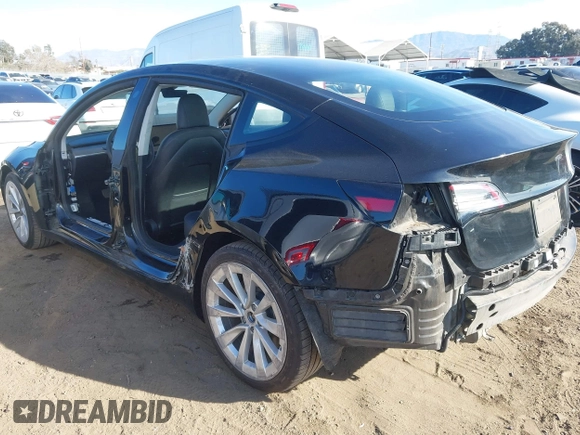 2022 Tesla Model 3 with VIN 5YJ3E1EA9NF295890, listed as a IAAI auction lot 41175917 with 42,230 mi miles and . Bid and sale history available at DreamBid. Image 3.