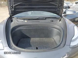 2018 Tesla Model 3 Long Range Battery with VIN 5YJ3E1EB5JF063077, listed as a IAAI auction lot 41773551 with 99,477 mi miles and . Bid and sale history available at DreamBid. Image 10.