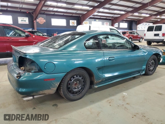 1996 Ford Mustang GT z VIN 1FALP42X5TF191769, wystawiony jako Copart lot #49364525 z przebiegiem 69 029 mil mil oraz Szkoda całkowita • Salvage title. Historia ofert i sprzedaży dostępna na DreamBid. Obrazek 3.