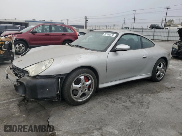 2004 Porsche 911 Carrera z VIN WP0AA29904S623031, wystawiony jako Copart lot #76551074 z przebiegiem 145 478 mil mil oraz Szkoda całkowita • Salvage title. Historia ofert i sprzedaży dostępna na DreamBid. Obrazek 1.