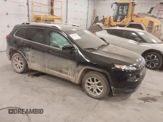 2015 Jeep Cherokee Latitude with VIN 1C4PJLCS8FW689849, listed as a IAAI auction lot 42144161 with 138,740 mi miles and . Bid and sale history available at carsss.com. Image 1.