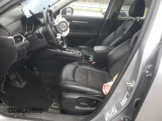 2020 Mazda CX-5 Touring z VIN JM3KFBCM2L0768348, wystawiony jako Copart lot #87813065 z przebiegiem Nie podano mil oraz Szkoda całkowita • Salvage title. Historia ofert i sprzedaży dostępna na DreamBid. Obrazek 7.