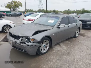2003 BMW 7 Series 745i с VIN WBAGL63473DP64462, выставлен на аукционе IAAI как лот 41751691 с пробегом 146 789 миль миль и . История ставок и продаж доступна на DreamBid. Изображение 2.