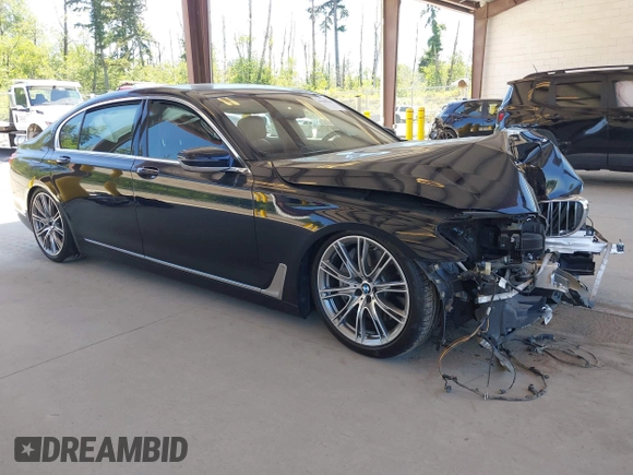 2017 BMW 7 Series 750i z VIN WBA7F0C59HGM21185, wystawiony jako IAAI lot #42360146 z przebiegiem Nie podano mil oraz . Historia ofert i sprzedaży dostępna na DreamBid. Obrazek 1.