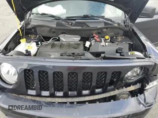 2015 Jeep Patriot Latitude with VIN 1C4NJRFBXFD176250, listed as a Copart auction lot 58903295 with 72,675 mi miles and Salvage title. Bid and sale history available at DreamBid. Image 12.