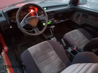 1987 Toyota Corolla с VIN 1NXAE89G0HZ406025, выставлен на аукционе Copart как лот 86453694 с пробегом 210 704 миль миль и Списание • Salvage title. История ставок и продаж доступна на DreamBid. Изображение 8.