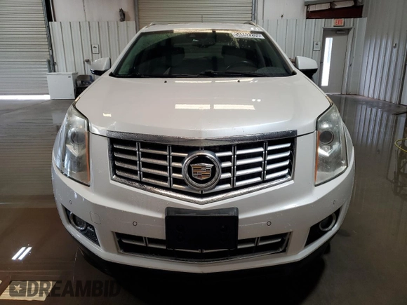 2015 Cadillac SRX Performance Collection with VIN 3GYFNCE36FS531134, listed as a Copart auction lot 54862205 with 103,051 mi miles and Clean title. Bid and sale history available at DreamBid. Image 5.