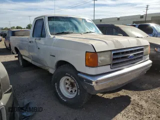 1990 Ford F-150 with VIN 1FTDF15Y8LPA78476, listed as a Copart auction lot 86521784 with 42,369 mi miles and Clean Title. Bid and sale history available at carsss.com. Image 4.