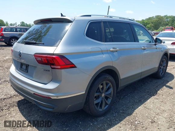 2022 Volkswagen Tiguan SE with VIN 3VV2B7AX2NM074369, listed as a IAAI auction lot 42522561 with 47,752 mi miles and . Bid and sale history available at DreamBid. Image 4.