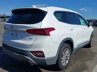 2019 Hyundai Santa Fe SEL z VIN 5NMS3CADXKH071437, wystawiony jako IAAI lot #41752902 z przebiegiem 66 980 mil mil oraz . Historia ofert i sprzedaży dostępna na DreamBid. Obrazek 4.