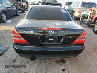 1999 Mercedes-Benz SLK-Class with VIN WDBKK47F1XF124854, listed as a Copart auction lot 73160604 with 55,730 mi miles and Salvage Title. Bid and sale history available at carsss.com. Image 6.