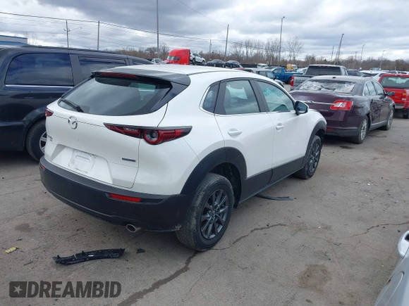 2023 Mazda CX-30 S z VIN 3MVDMBAM6PM572425, wystawiony jako IAAI lot #41833170 z przebiegiem 18 307 mil mil oraz . Historia ofert i sprzedaży dostępna na DreamBid. Obrazek 4.