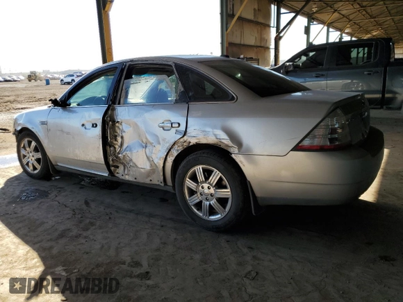 2009 Ford Taurus Limited with VIN 1FAHP25W99G123958, listed as a Copart auction lot 75100894 with 187,735 mi miles and Salvage Title. Bid and sale history available at carsss.com. Image 2.