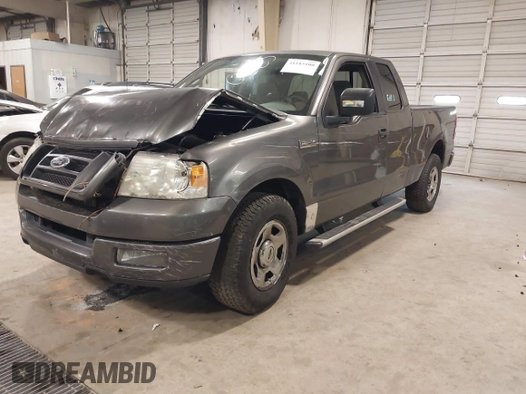 2005 Ford F-150 STX with VIN 1FTRX12W95NB38107, listed as a IAAI auction lot 41185100 with 201,171 mi miles. Bid and sale history available at carsss.com. Image 2.