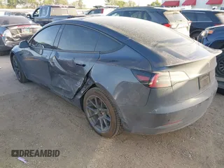 2022 Tesla Model 3 Long Range with VIN 5YJ3E1EB3NF264532, listed as a IAAI auction lot 41842044 with 42,280 mi miles and . Bid and sale history available at DreamBid. Image 3.